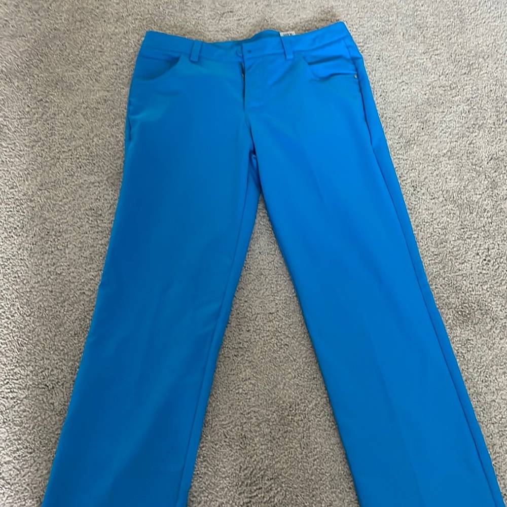 Size 33/30 puma Carolina blue golf pants. Wore once as a team outfit